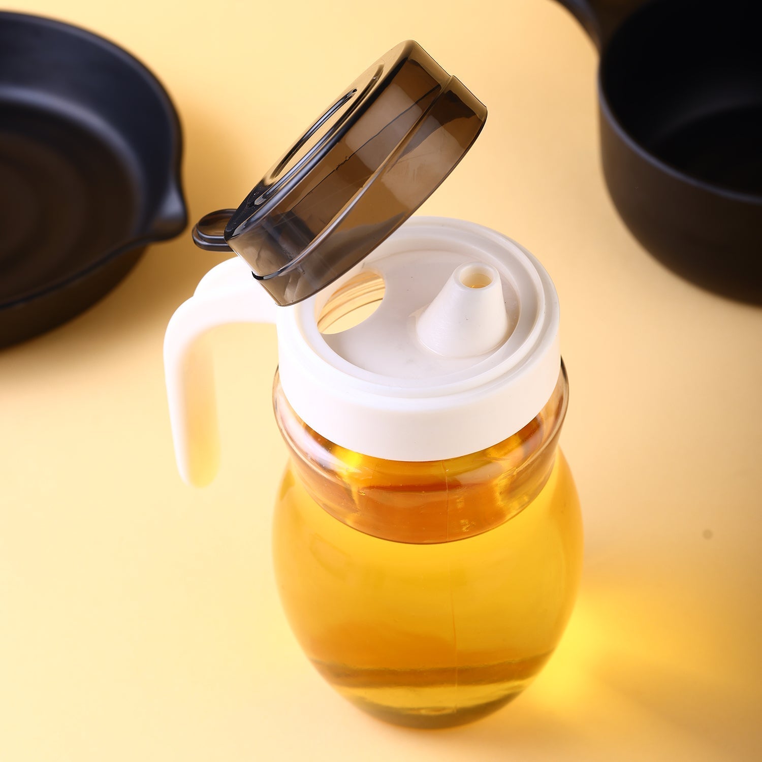 Steel oil bottle with easy pour spout. Steel oil bottle with easy pour spout.